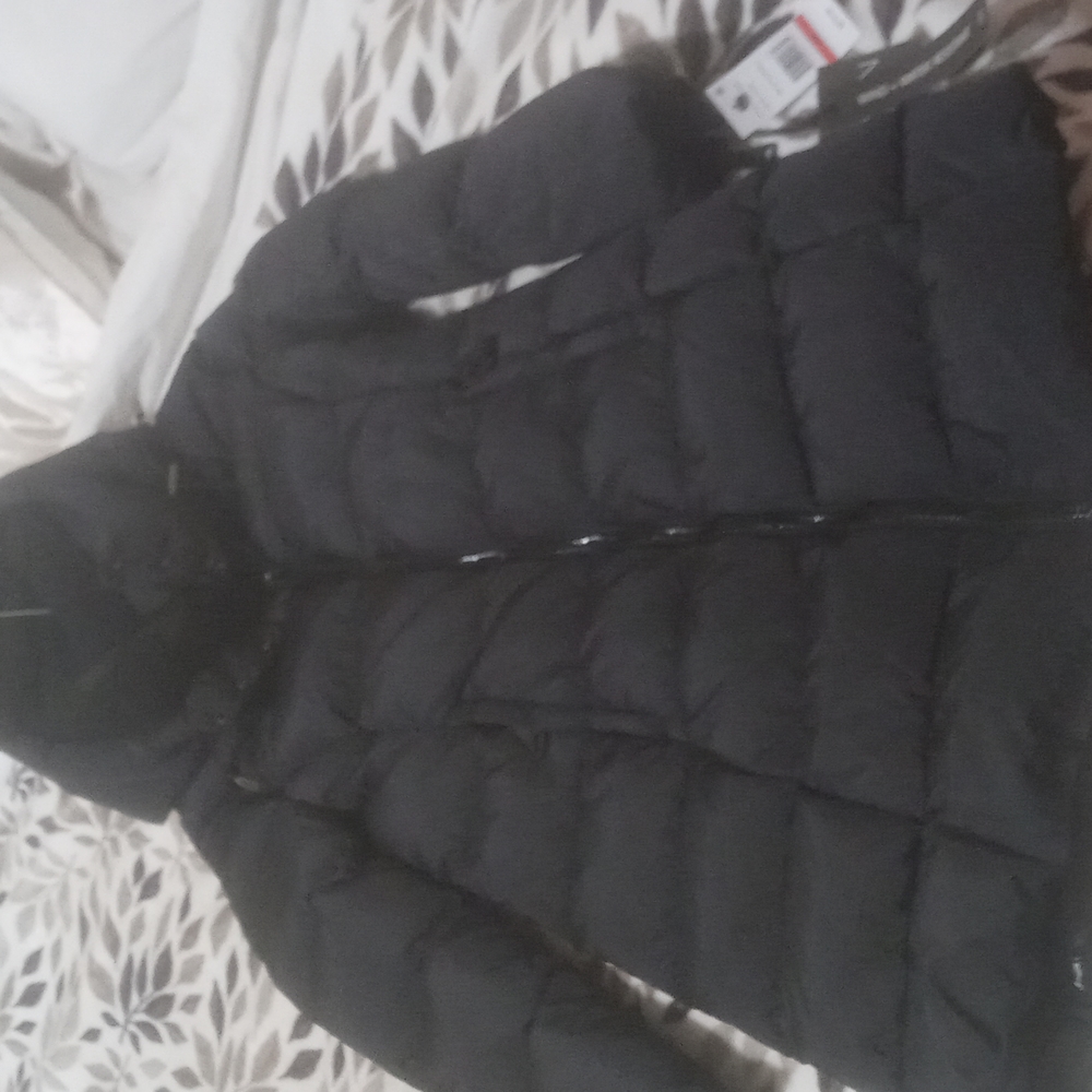 Sam of New York Hazelnut color jacket and long black coat.